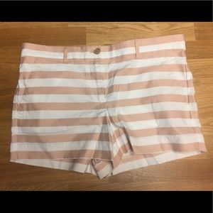 Pink and white striped shorts.